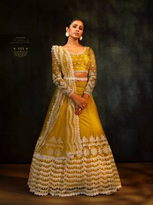 Yellow embroidered net semi stitched lehenga 1