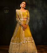 Yellow embroidered net semi stitched lehenga