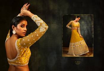 Yellow embroidered net semi stitched lehenga 3