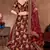 Appetizing Maroon Dori, Sequins, and Thread Embroidered Taffeta Silk Fabric Lehenga choli for Bride