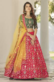 Red, green and yellow colored thread and sequins embroidered silk semi stitched lehenga