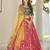 Red, green and yellow colored thread and sequins embroidered silk semi stitched lehenga