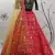 Red, green and yellow colored thread and sequins embroidered silk semi stitched lehenga