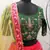 Red, green and yellow colored thread and sequins embroidered silk semi stitched lehenga