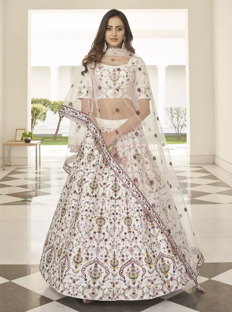 White thread and sequins embroidered silk semi stitched lehenga
