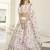 White thread and sequins embroidered silk semi stitched lehenga