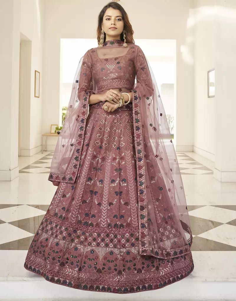 Rust orange thread and Sequins embroidered silk semi stitched lehenga