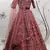Rust orange thread and Sequins embroidered silk semi stitched lehenga