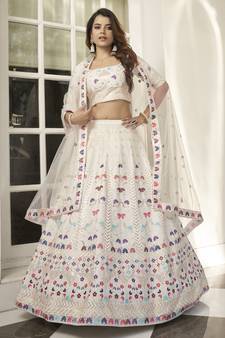 White thread and sequins embroidered silk semi stitched lehenga