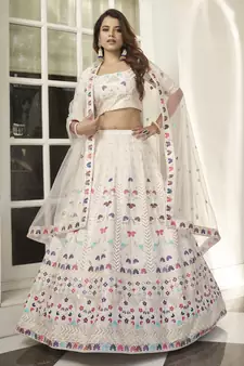White thread and sequins embroidered silk semi stitched lehenga