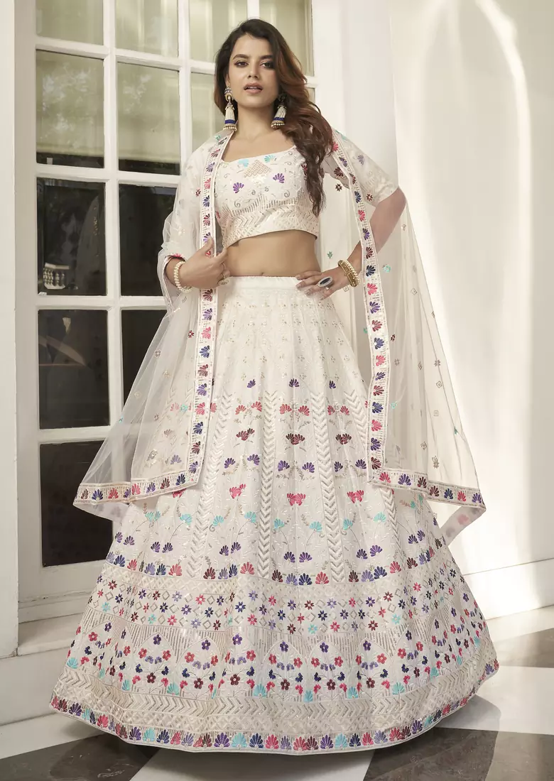 White thread and sequins embroidered silk semi stitched lehenga