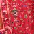 Red, green and yellow colored thread and sequins embroidered silk semi stitched lehenga