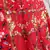 Red, green and yellow colored thread and sequins embroidered silk semi stitched lehenga