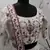 White thread and sequins embroidered silk semi stitched lehenga