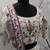 White thread and sequins embroidered silk semi stitched lehenga