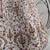 White thread and sequins embroidered silk semi stitched lehenga