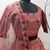 Rust orange thread and Sequins embroidered silk semi stitched lehenga
