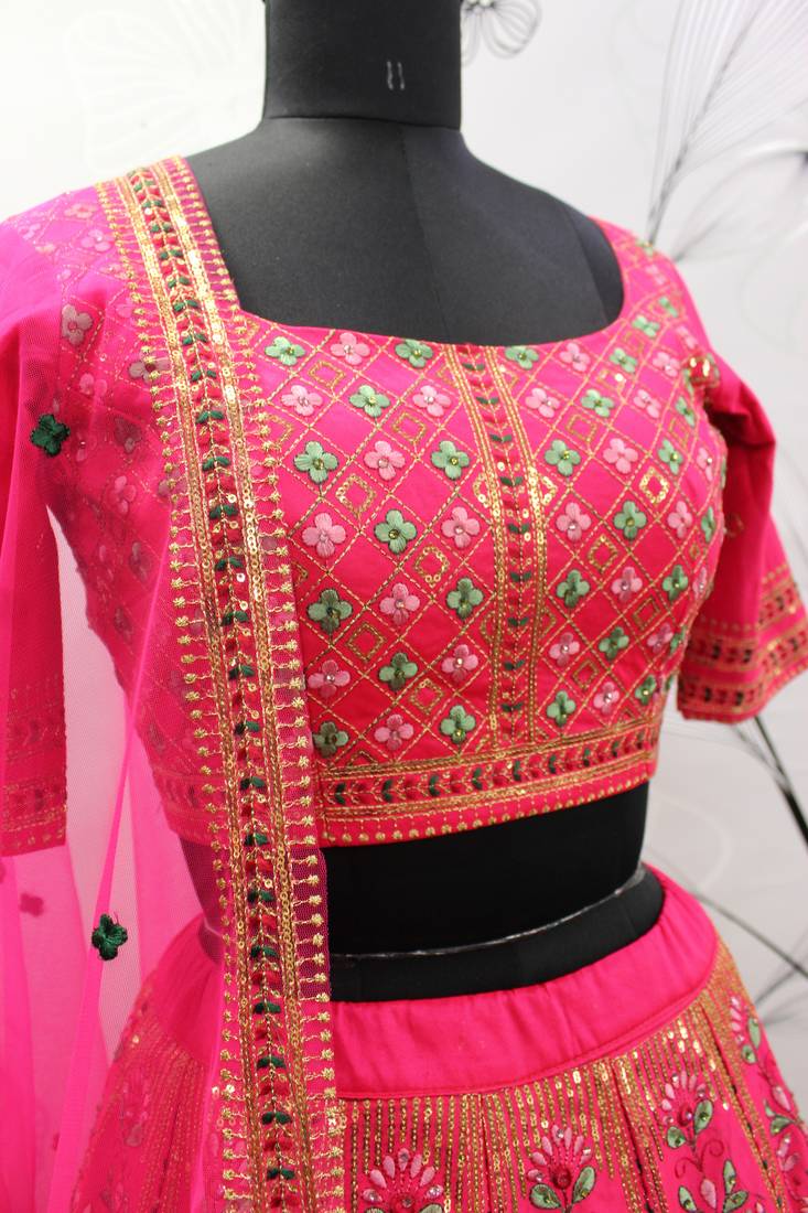 Hypnotizing Deep pink thread and Sequins embroidered silk semi stitched lehenga