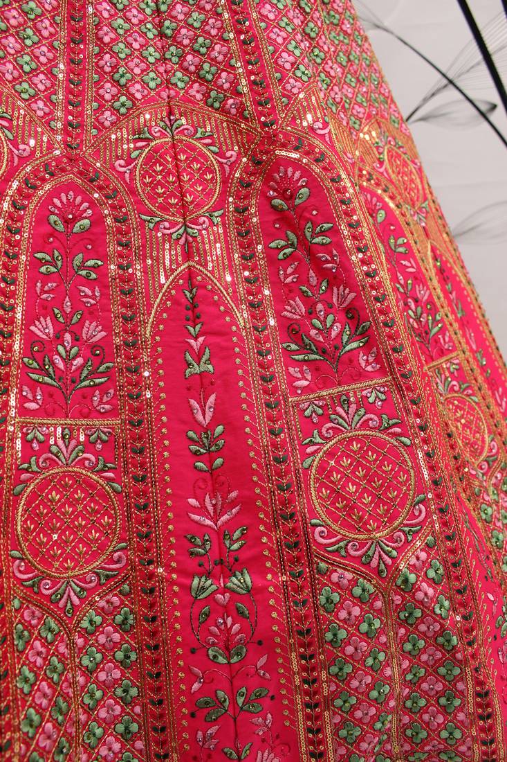 Hypnotizing Deep pink thread and Sequins embroidered silk semi stitched lehenga