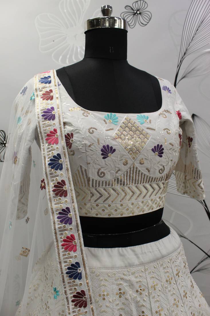Engaging White thread and sequins embroidered Silk Semi Stitched Lehenga