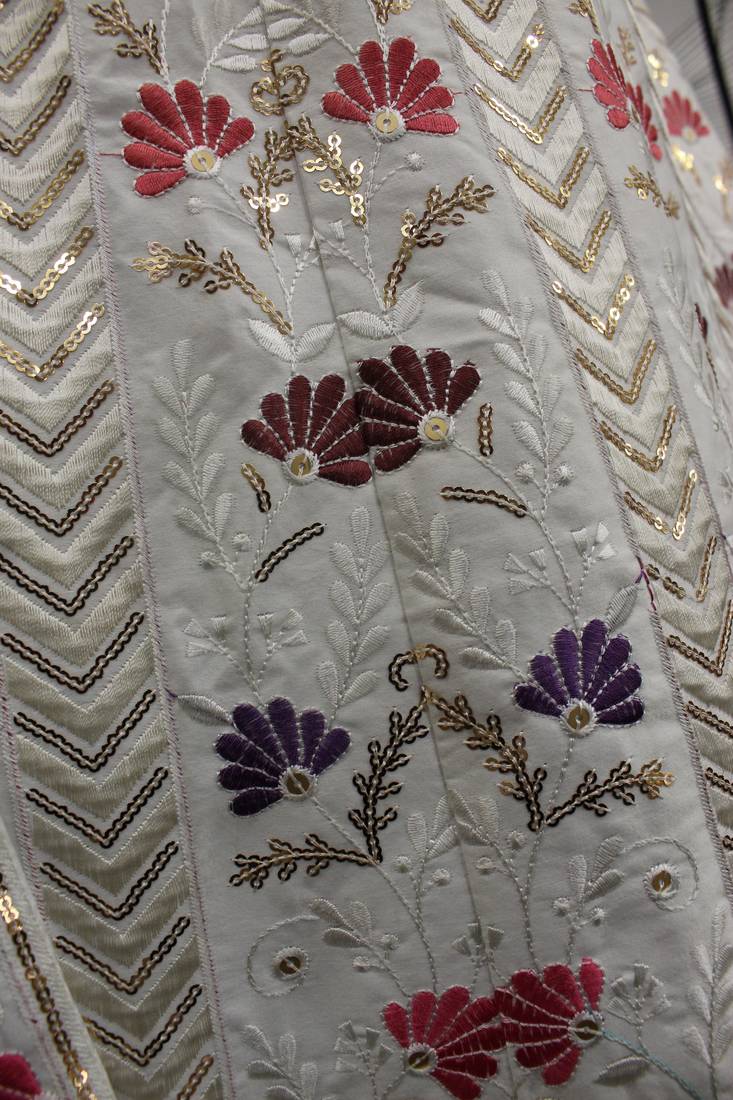 Engaging White thread and sequins embroidered Silk Semi Stitched Lehenga