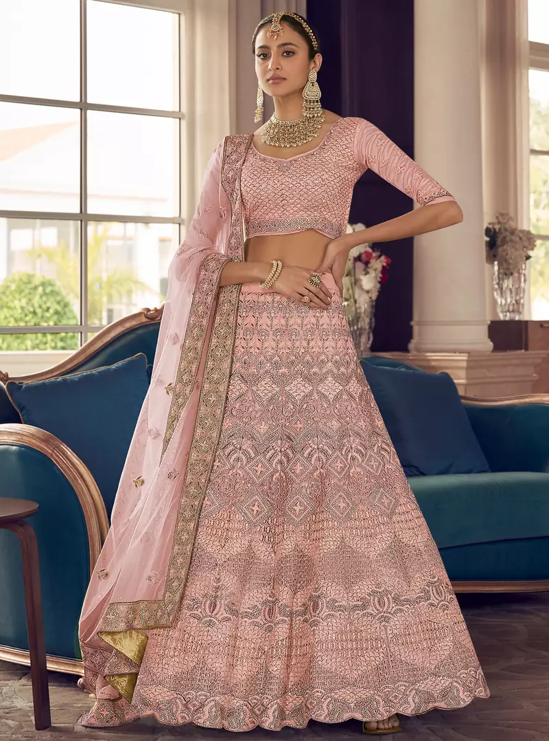 Clam Shell Peach zarkan, zari and thread embroidered crepe-silk semi stitched lehenga