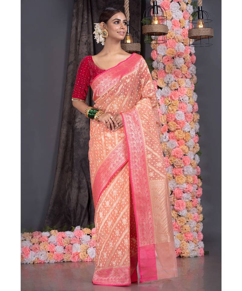 Tangerine Silk Organza Saree With Diagonal Stripes And Contrasting Zari Border