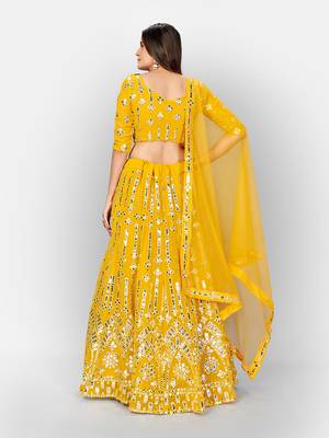 Yellow and SilverToned Embellished Mirror Work Semi stitched Lehenga and Unstitched Blouse With 3