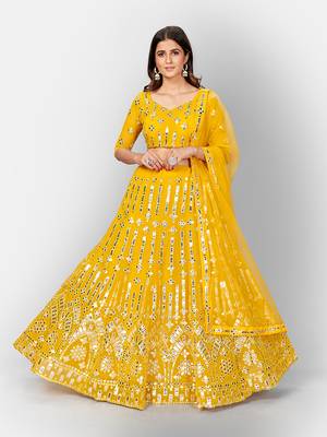 Yellow and SilverToned Embellished Mirror Work Semi stitched Lehenga and Unstitched Blouse With 5