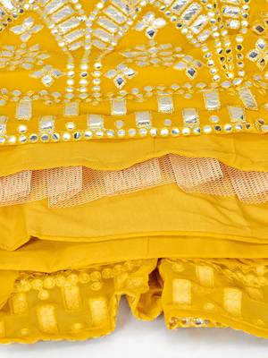 Yellow and SilverToned Embellished Mirror Work Semi stitched Lehenga and Unstitched Blouse With 10