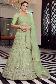 pista green colored mirror, zari, zarkan, thread, embroidered organza semi stitched lehenga