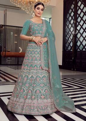 Delightful turquoise colored mirror, zari, zarkan, and thread embroidered organza Lehenga 1