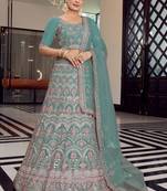 Delightful turquoise colored mirror, zari, zarkan, and thread embroidered organza Lehenga