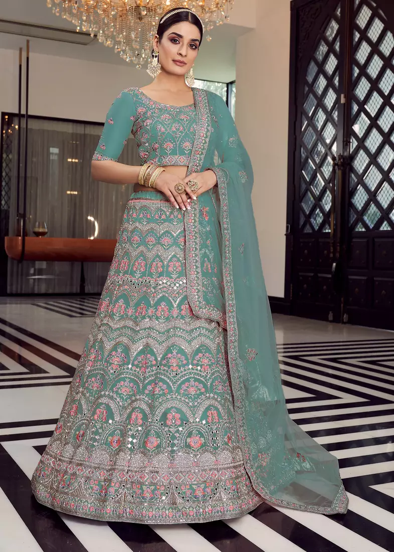 turquoise colored mirror, zari, zarkan, thread, embroidered organza semi stitched lehenga