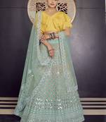 Turquoise gotta patti and thread embroidered organza party wear Lehenga choli