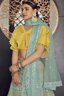 Turquoise gotta patti and thread embroidered organza party wear Lehenga choli