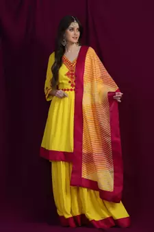 Chikankari Yellow rayon kurti  and  garara with pink silk  border paired with yellow kota  leheriya duppatta