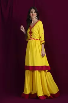 Chikankari Yellow rayon kurti  and  garara with pink silk  border paired with yellow kota  leheriya duppatta
