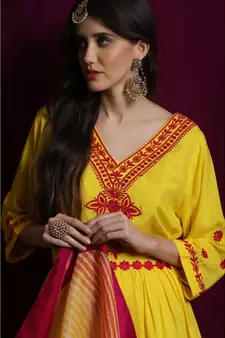 Chikankari Yellow rayon kurti  and  garara with pink silk  border paired with yellow kota  leheriya duppatta