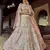 Off-white sequins, zari and resham embroidered georgette semi stitched wedding lehenga