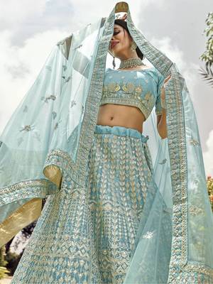 Turquoise embroidered organza semi stitched lehenga 3