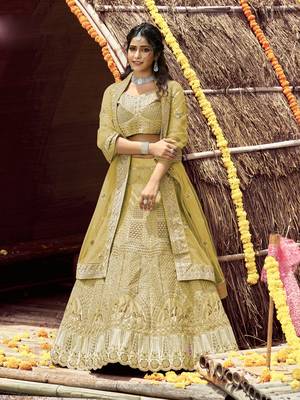 Yellow embroidered velvet semi stitched lehenga 1