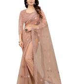 Beige embroidered net saree with blouse