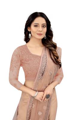 Beige embroidered net saree with blouse 2