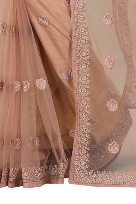 Beige embroidered net saree with blouse 3