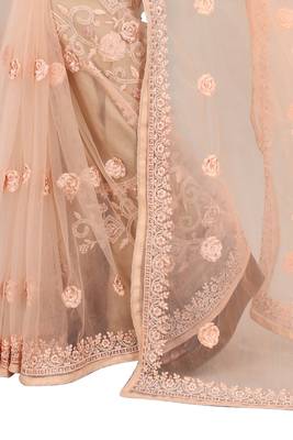 Peach embroidered net saree with blouse 3