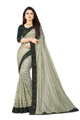 Green embroidered net saree with blouse 1