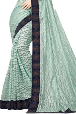 Sea green embroidered net saree with blouse 2
