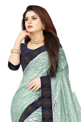 Sea green embroidered net saree with blouse 3