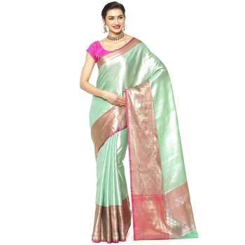 Green woven Faux kanchipuram silk saree with blouse 1